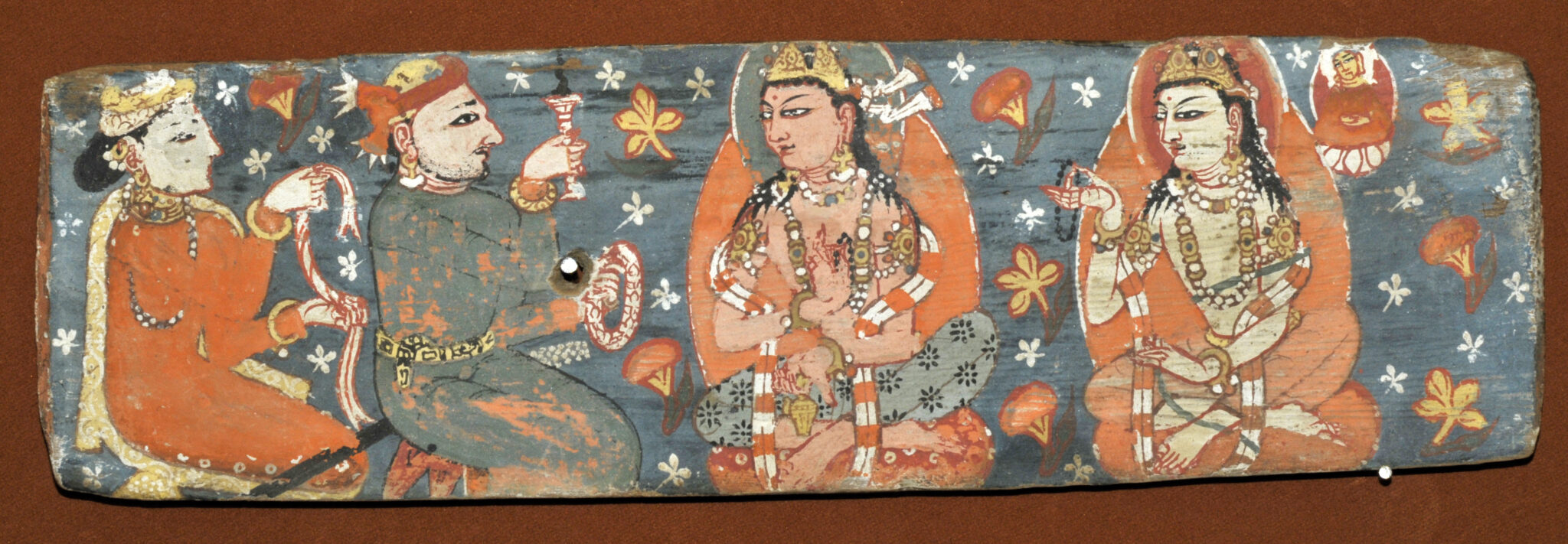 Painting on rectangular panel of two bodhisattvas and two worshippers seated against blue background with floral motif