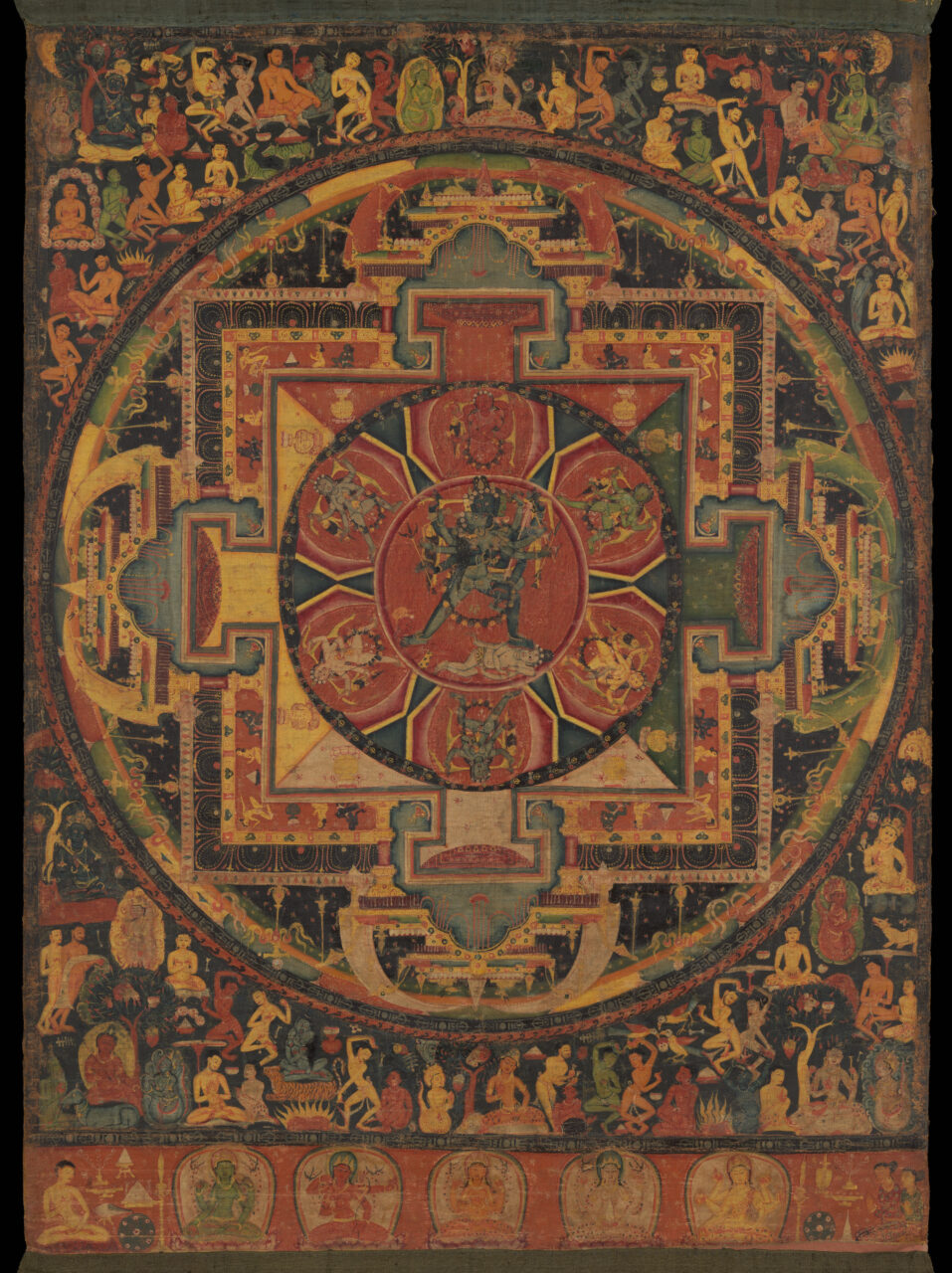 Blue-skinned deity stands in center of geometric arrangement of circles and squares featuring architectural forms at cardinal points