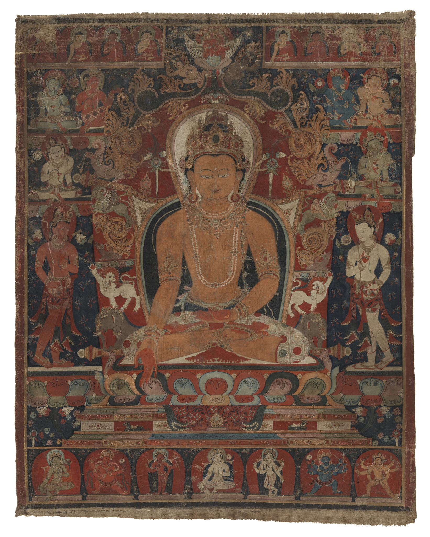 Crowned Buddha seated on lotus throne, surrounded by attendants and deities arranged in registers