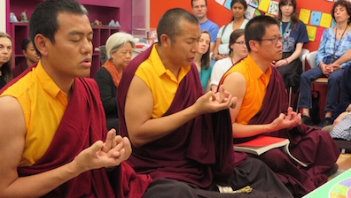 During their final ritual, the monks make many mudras, or symbolic hand gestures. This particular mudra is meant to symbolize a three dimensional mandala.
