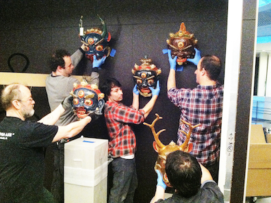 "A little to the left!" Our team maps out the placement of a selection of masks.