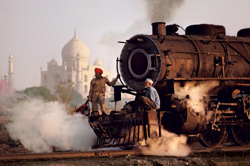 Steve McCurry; Steam Engine Passes in Front of the Taj Mahal; Agra, Uttar Pradesh, India; 1983 