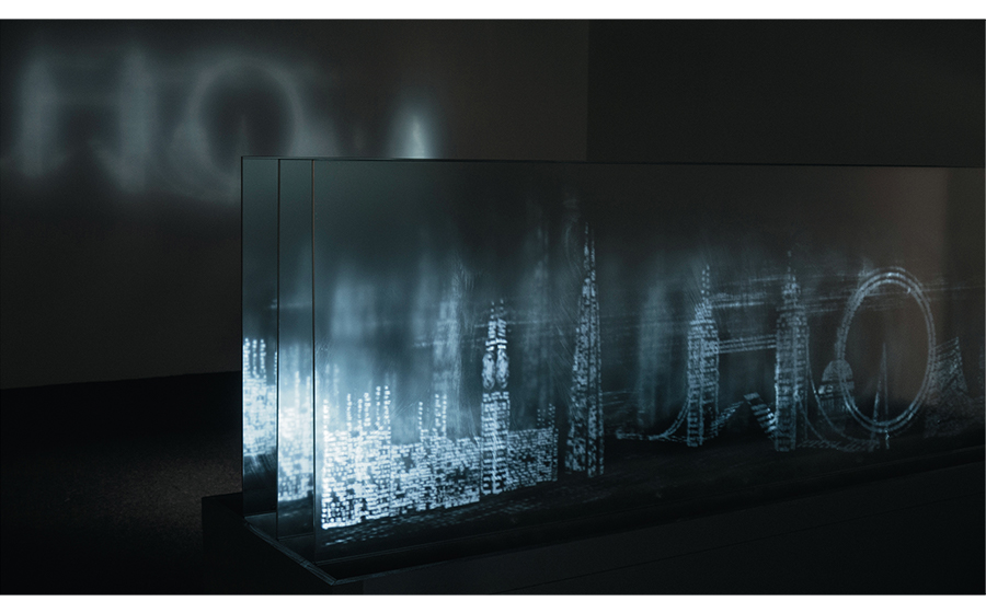 Monika Bravo (b. 1964, BogotÃ¡, Columbia); Landscape of Belief; 2012; glass, mirror, projector, media player, aluminum, wood, text from Italo Calvino's Invisible Cities, time-based electronic installation; courtesy of the artist and Johannes Vogt Gallery