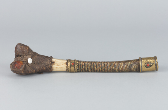 Leg Bone Trumpet (Kang Ling); Tibet; 18th–19th century; human bone, copper, coral, leather; Rubin Museum of Art; Gift of Robert and Lois Bayils; SC2019.3.