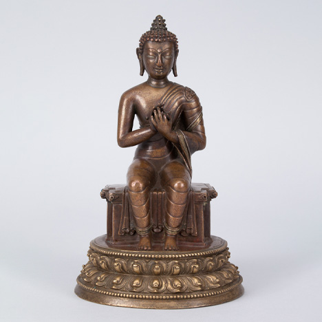 Maitreya (or Buddha Shakyamuni); Tibet; 14th century; brass with copper alloy, silver and copper inlay; Rubin Museum of Art; C2005.16.33 (HAR 65456)