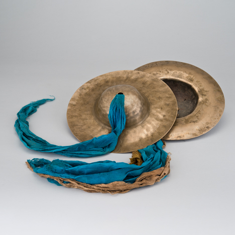 Pair of Cymbals; Mongolia; 18th–19th century; metal alloy, silk; Rubin Museum of Art; gift of Shelley and Donald Rubin; SC2012.7.12a-c
