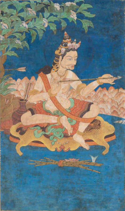 Painting of a crowned figure seated on a tiger skin holding an arrow, with a quiver beside him, under a flowering tree against a deep blue background with mountains and floating arrows below.