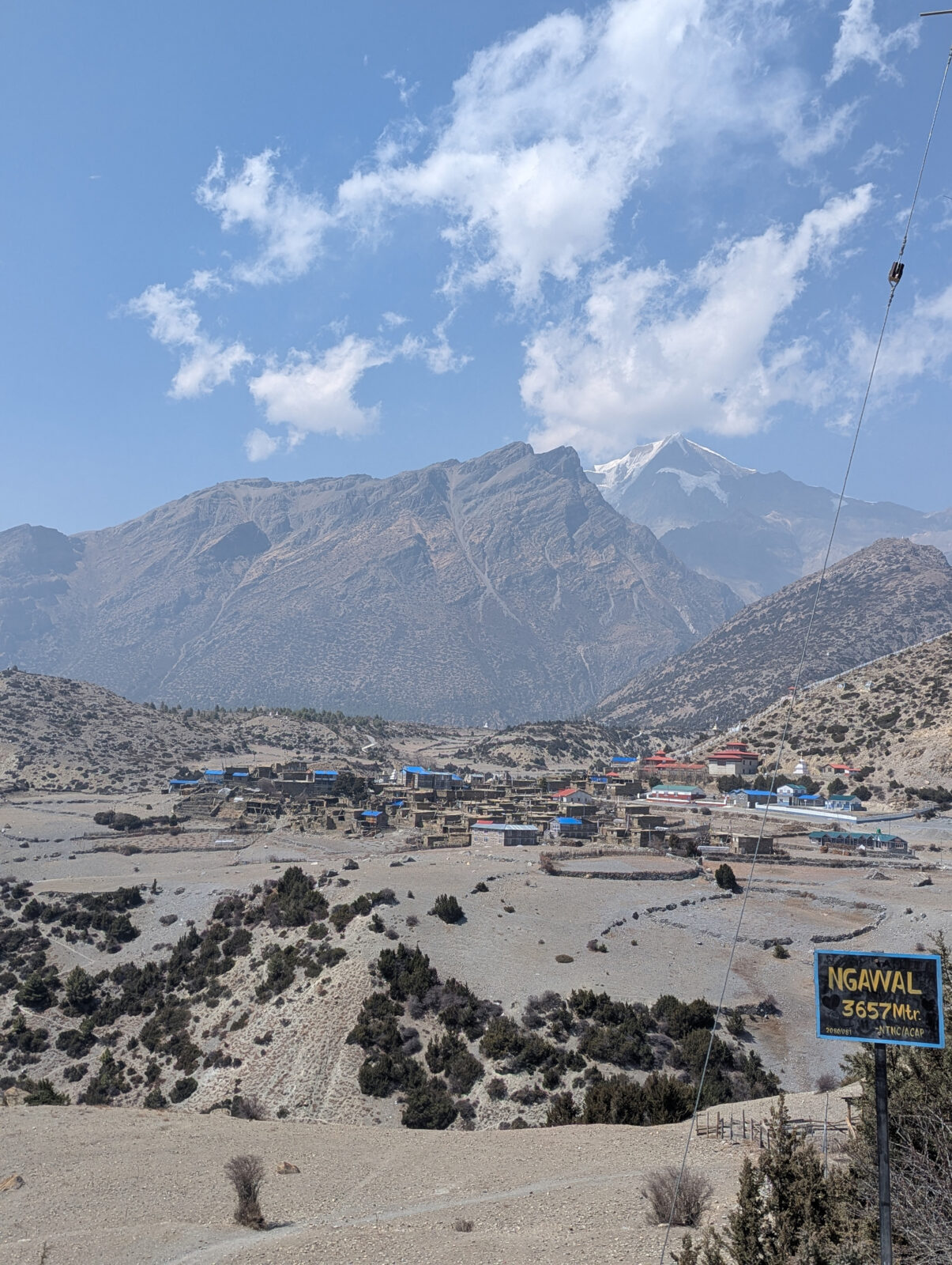 mountain range in background and the village of Ngawal in forefront