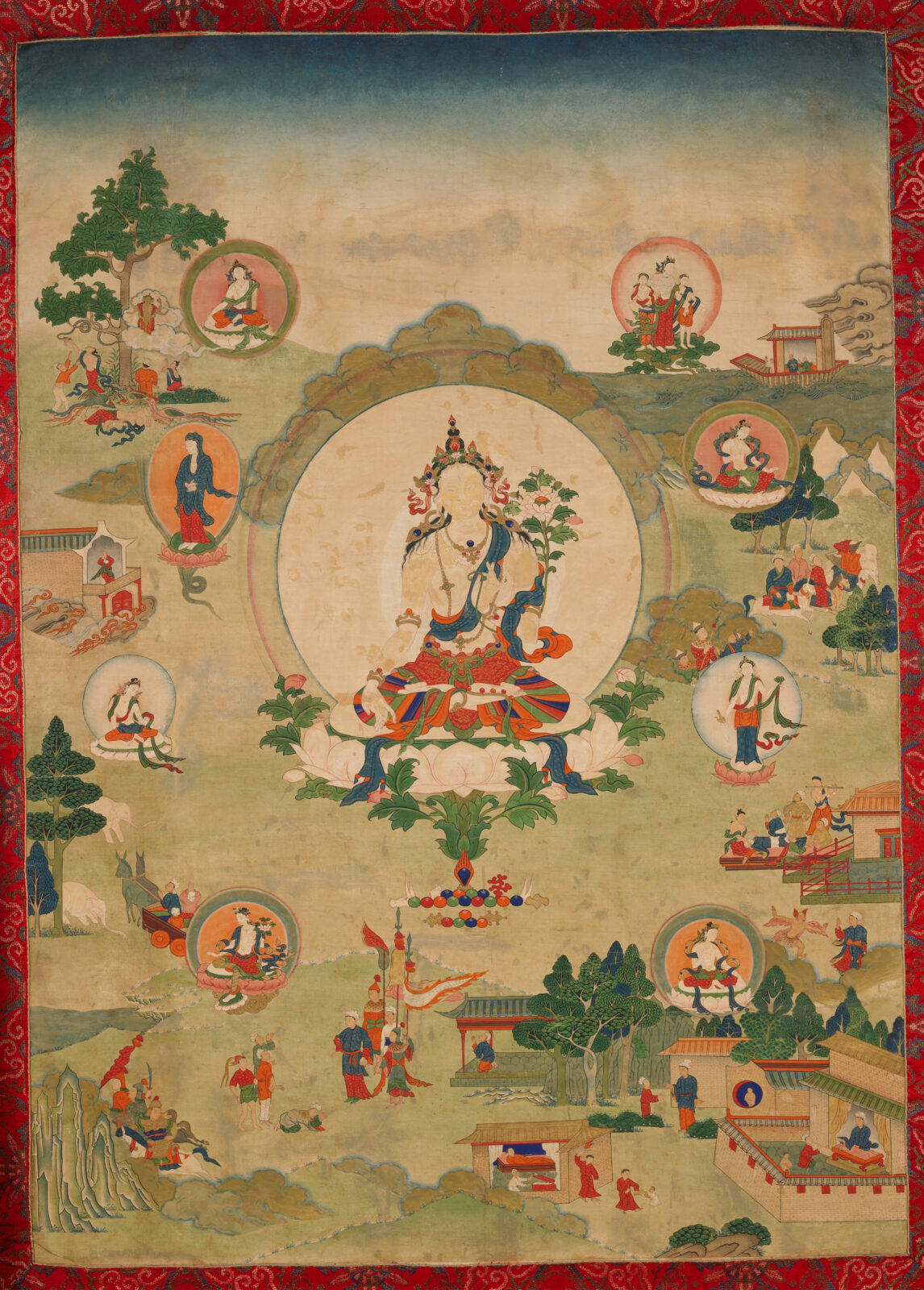 Painting of large figure seated on lotus blossom in landscape surrounded by eight smaller figures.