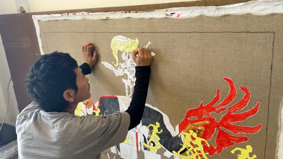 tenzin gyurmey dorjee painting in his studio