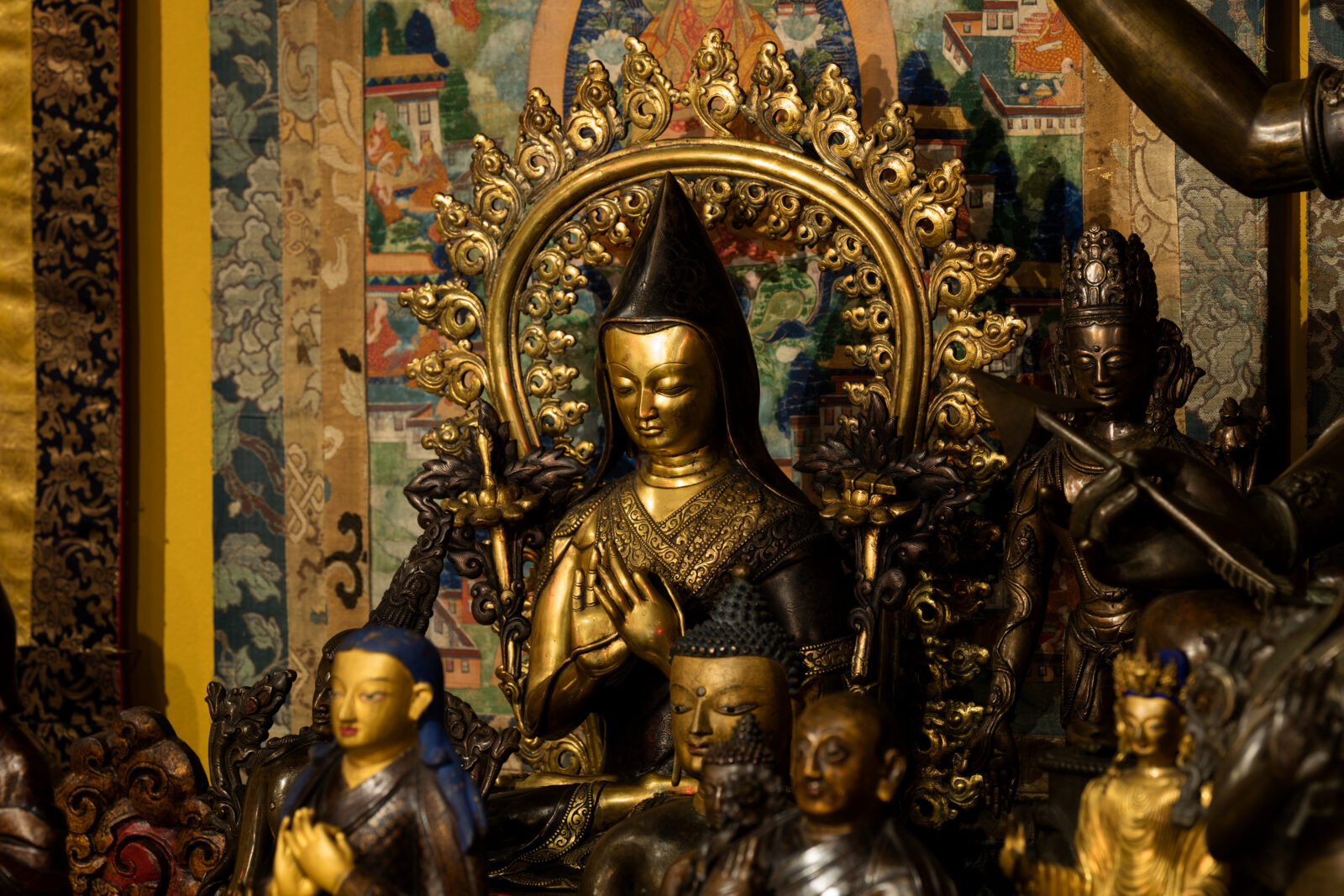 close up photograph of sculptures in the tibetan buddhist shrine room installation