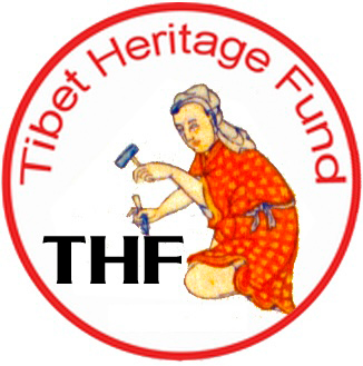 A red circle with a figure holding a hammer, and the text "Tibet Heritage Fund" and "THF"